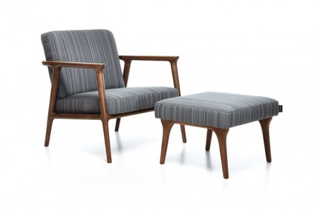The Zio Lounge Chair, and footstool, have solid oak frames and are available in a curated collection of fabrics and leathers. 